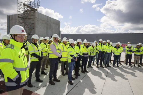 Site group of men back turned